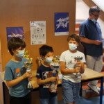 Jeunes joueurs masqués alignés avec leurs trophées à l'issue de l'étape du Grand Prix Jeunes de l'Essonne.