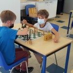 Deux jeunes joueurs masqués face à face lors de l'étape du Grand Prix Jeunes de l'Essonne 2021.